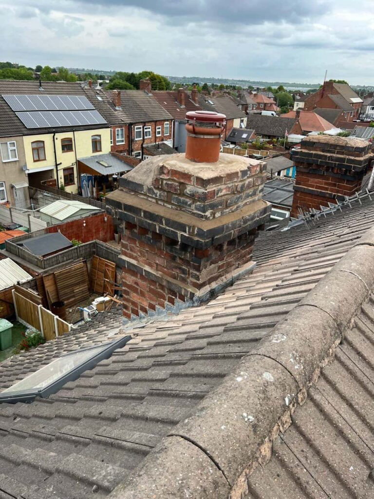 This is a photo taken from a roof which is being repaired by Dinnington Roofing Repairs, it shows a street of houses, and their roofs